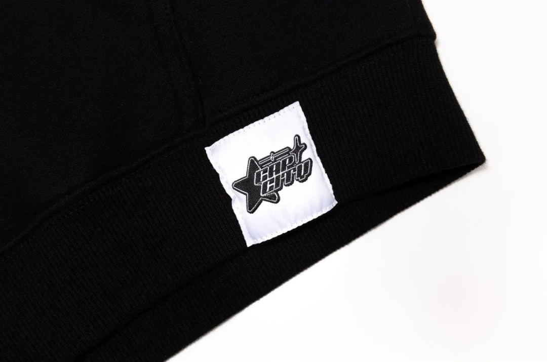 NEW* HERENCIA DE PATRONES x CAP CITY BLACK "CLIKA SHI" ZIP UP HOODIE - Image 3